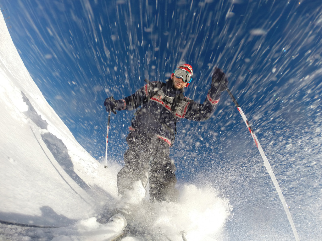 Downhill alpine skiing at high speed on powder snow. Taken with GoPro 3 mounted directly on the ski tip. Model released.
